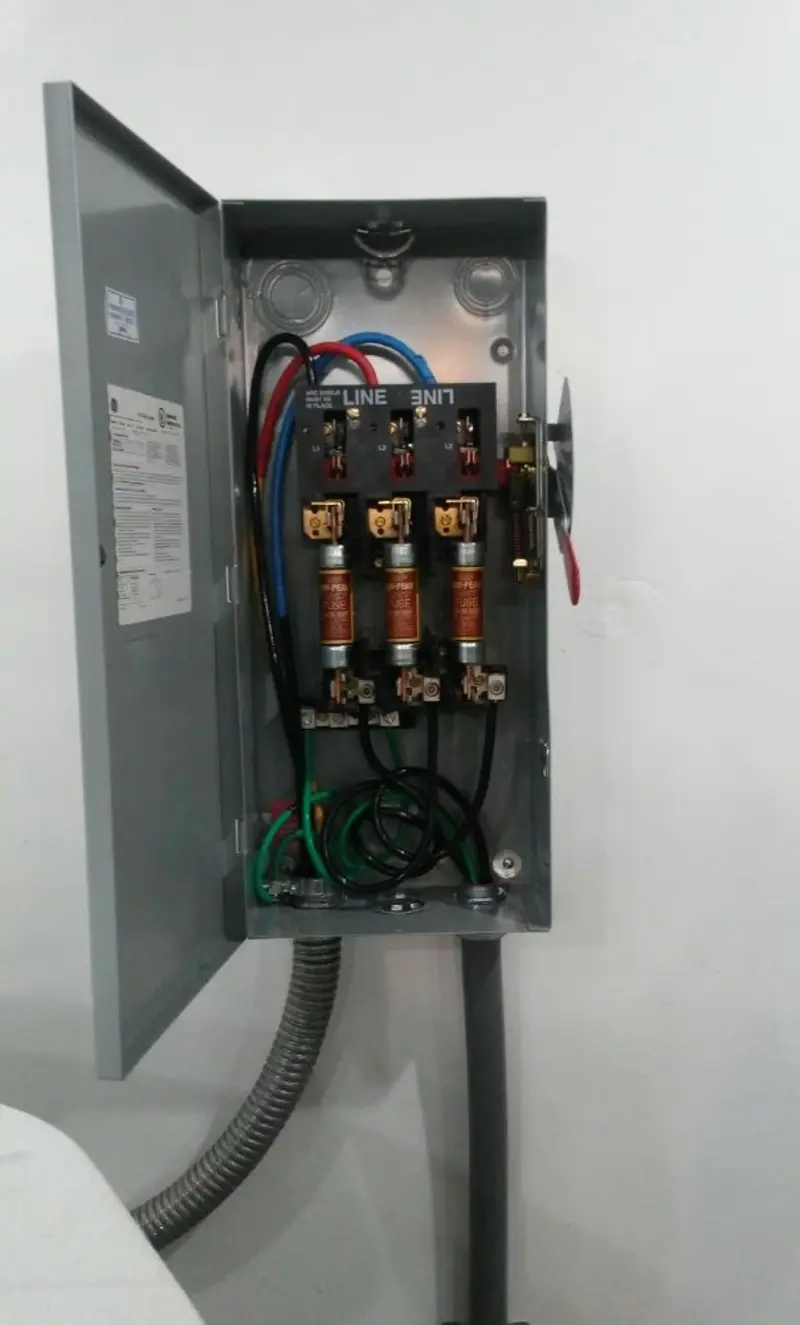 Three-phase disconnect switch installed for Smoke Detector Installation in Holiday